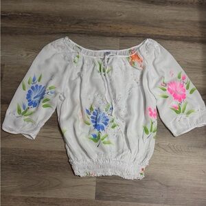 Elegant White Blouse with Vibrant Floral Design